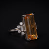 hite gold ring with topaz and diamond