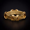 Gold ring, twisted with smooth bands