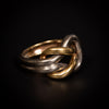 Ring met liefdesnkoop in goud en platina