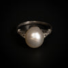 Antique ring with natural pearl and diamonds