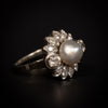 Vintage ring with bouton pearl and diamonds