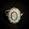 Art Deco platinum ring with diamonds and emeralds