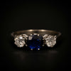 White gold ring with sapphire and diamonds