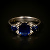 White gold ring with sapphires and diamonds