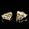 Asymmetrical gold clip brooches