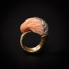 Gold ring with coral bird head